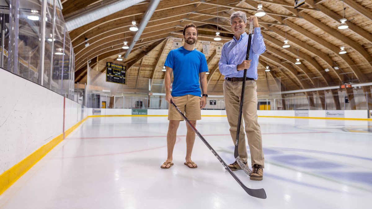 UWCheritonCS's tweet photo. David Radke, Prof Tim Brecht &amp; Daniel Radke win best research paper award at LINHAC 2022! They developed a mathematical model that uses puck-and-player tracking data to classify types of passes and determines the availability of potential pass receivers.

https://t.co/d4llVtKVBn https://t.co/AjjZSiiGo8