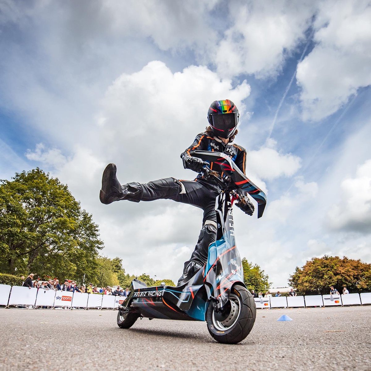 A throwback to last weekend at <a href="/fosgoodwood/">Goodwood FOS</a> with <a href="/jordan_rand/">Jordan Rand</a> 🇬🇧
Goodwood is one of the most important motorsport festivals in the world. What an incredible opportunity to watch Helbiz Racing number 23 racing on the track 🛴

#HelbizRacing <a href="/eSC_LIVE/">eSkootr Championship ⚡🛴</a>