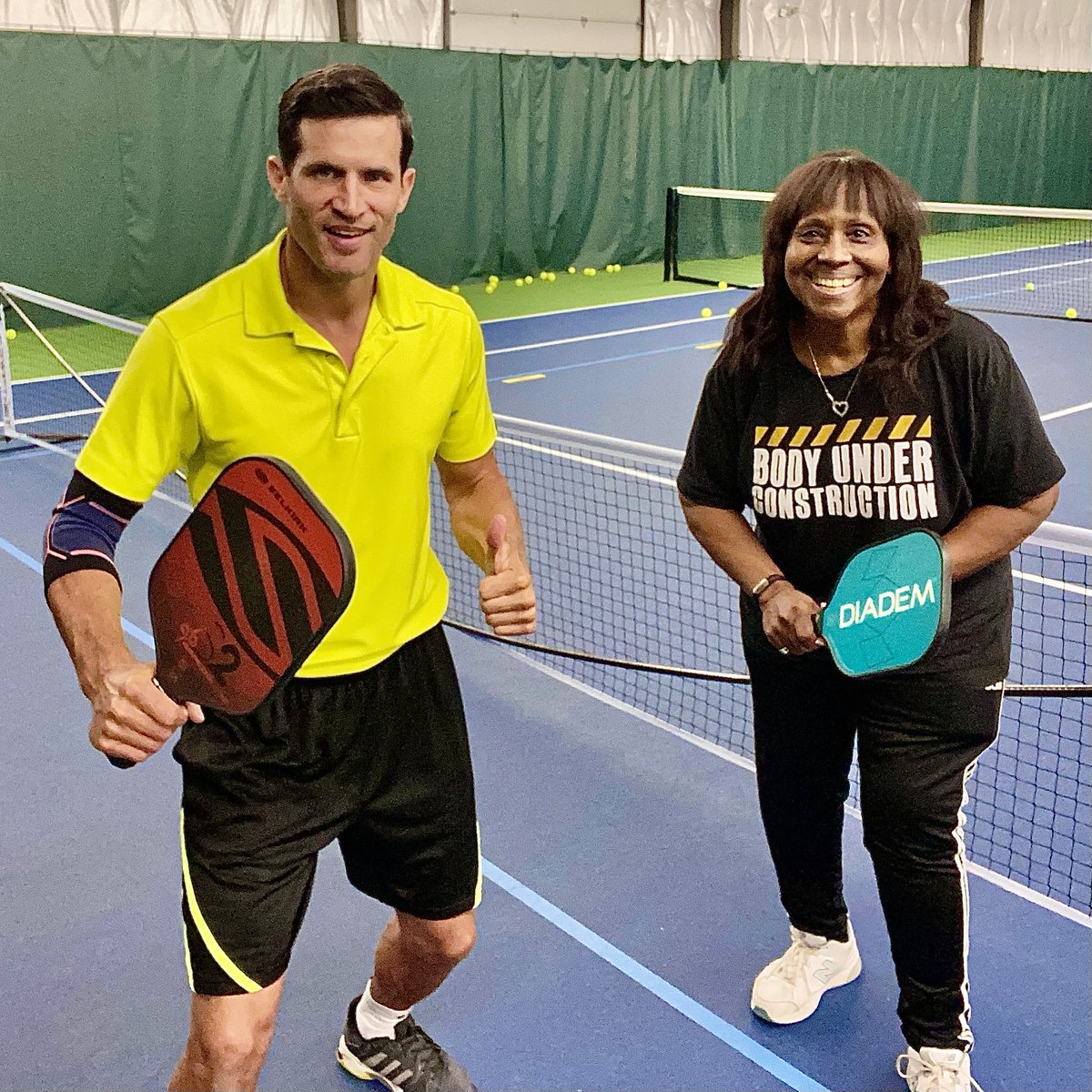 BigQuizThing's tweet photo. Our own Quizmaster @AndyPeeke recently gave a #pickleball lesson to Dr. Yvonne Thornton: In addition to being a pioneering OB/GYN and author, Dr. Thornton was the first ever person of color to compete on Jeopardy! (back in 1969). #Jeopardy #TriviaCelebs https://t.co/pKkf5BBWWD