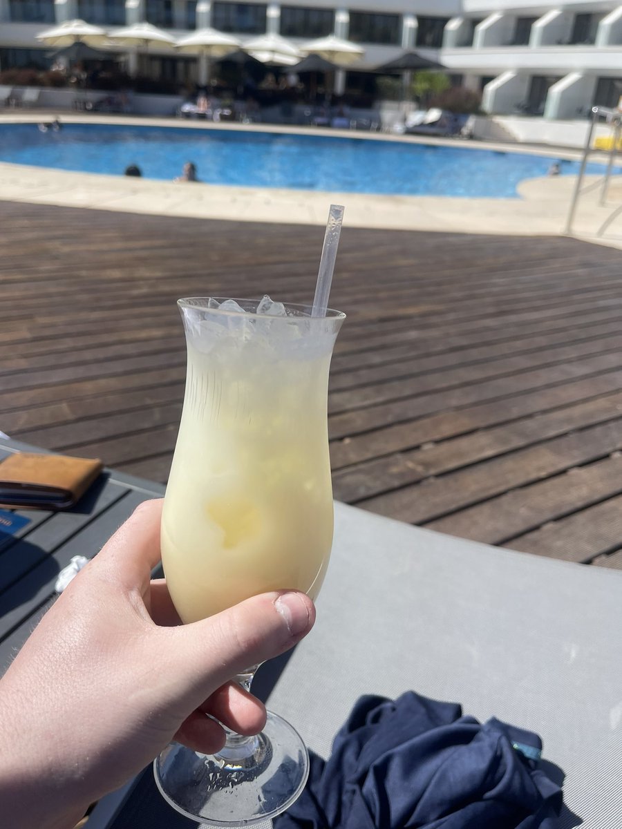 Finally settled into the hotel at the Algarve, having a Pina Colada with the wife and looking at twitter for all the good news/rumors on Arsenal - could be a fun week! #AFC #Transfers #COYG