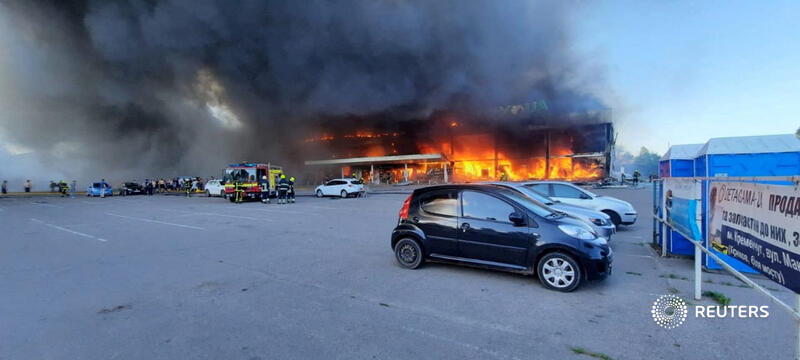 Reuters's tweet photo. A Russian missile strike hit a crowded shopping center in the central Ukrainian city of Kremenchuk, killing at least two people and wounding 20, senior Ukrainian officials said https://t.co/tULV78OkLU https://t.co/3rzBW6ekKr