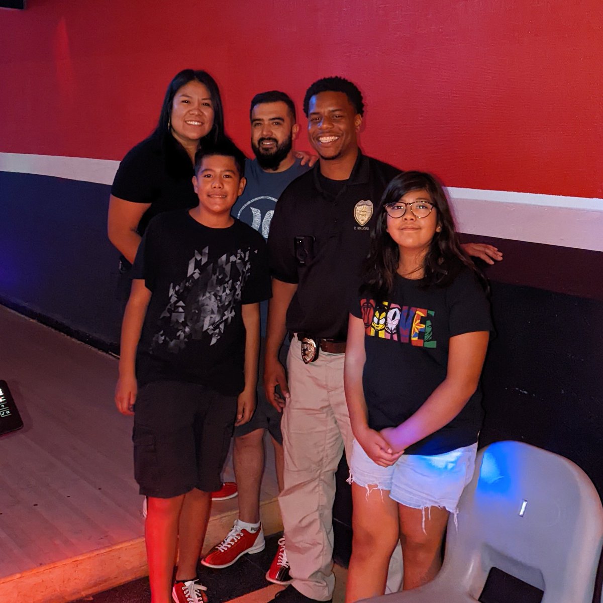 AuroraPD's tweet photo. Community Relations Section Officers followed through and awarded a bowling pizza party to this family who won the prize during our Faith and Blue Weekend! #CommunityCommitment #APDInAction https://t.co/aBYw3SVT6K