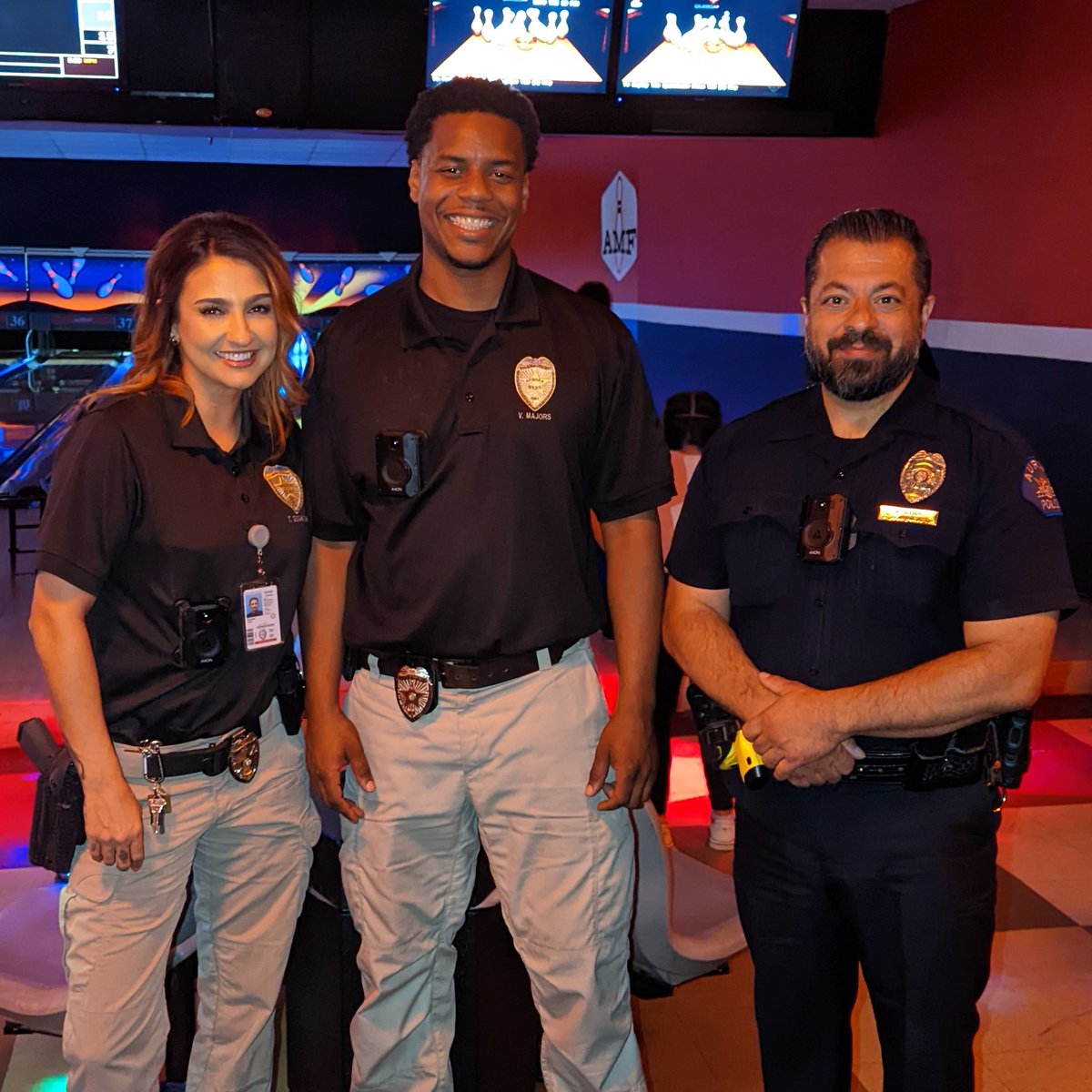 AuroraPD's tweet photo. Community Relations Section Officers followed through and awarded a bowling pizza party to this family who won the prize during our Faith and Blue Weekend! #CommunityCommitment #APDInAction https://t.co/aBYw3SVT6K