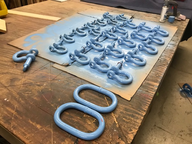 UnitedStaging's tweet photo. Making our new shackles "United Baby Blue".  What colors do you make your gear? (Or what colors have you seen?)  

#unitedstaging #babyblue #rigginggear #shackles #masterlink #spraypaint  #equipment #maintenance #usr #shopwork #rigging #painting #eventproduction #stagetech https://t.co/uitUf5boZ7