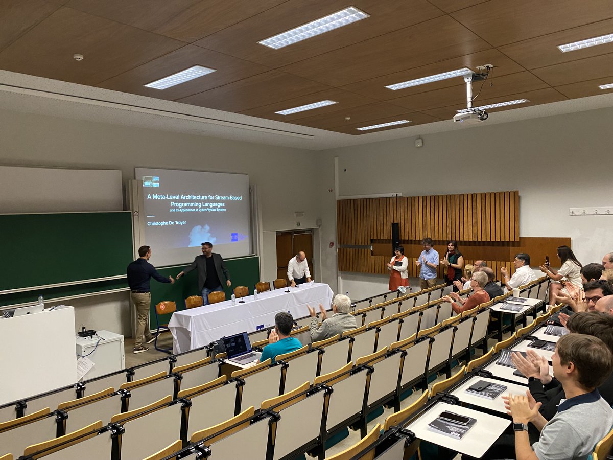 CoenDeRoover's tweet photo. Congratulations, Dr. @cdetroyer! Our newest @softlab_brussel @DINFVUB @VUBrussel doctor defended the PhD thesis "A Meta-Level Architecture for Stream-Based Programming Languages and Its Applications in Cyber-Physical Systems"! Action shot w/ promotors @wdmeuter @eljenso included. https://t.co/qQB3QDxtsQ