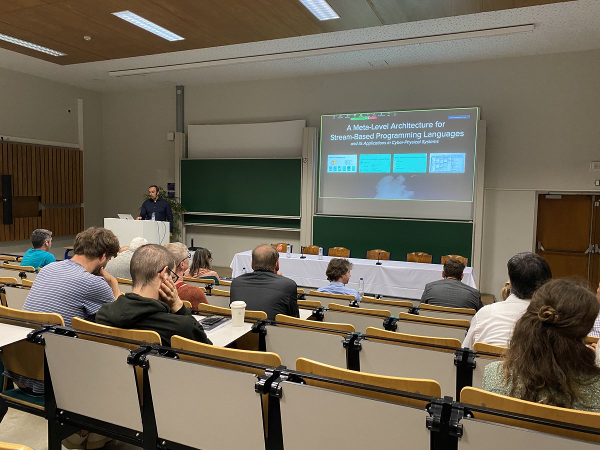 CoenDeRoover's tweet photo. Congratulations, Dr. @cdetroyer! Our newest @softlab_brussel @DINFVUB @VUBrussel doctor defended the PhD thesis "A Meta-Level Architecture for Stream-Based Programming Languages and Its Applications in Cyber-Physical Systems"! Action shot w/ promotors @wdmeuter @eljenso included. https://t.co/qQB3QDxtsQ
