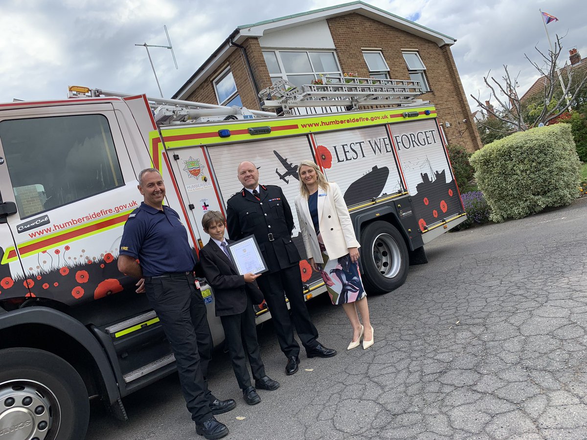 HumbersideFire's tweet photo. A special day at Peaks Lane as @FireChiefChrisB presents Christian Clark with a commendation for his actions in alerting fire crews to a fire in Grimsby. CM Steve Maloney and @OAWintringham head Heidi Stennett joined the presentation. https://t.co/0Fc9pip0Lm