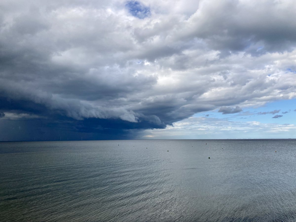 Storm clouds gathering over the Isle of Sheppey …. as seen from (a sunny) Herne Bay…