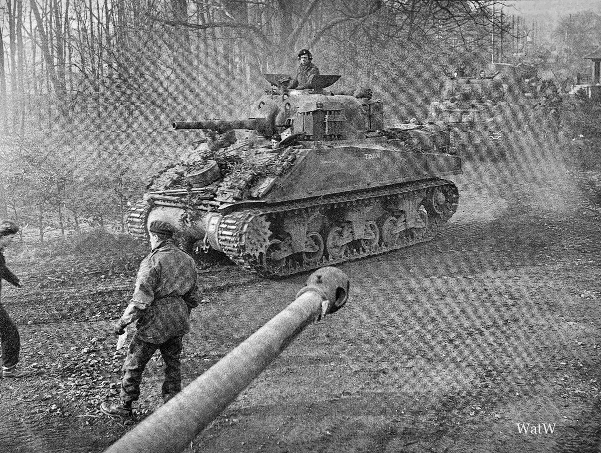 TheWorldatWar2's tweet photo. Trooper Austin Baker’s tank “Shaggy Dog” moves to the front - Battle of the Reichswald - March 1945. Note that track plates have been welded to the turret and the front of the tank as extra protection #ww2 #worldwar2 #reichswald #tank #britisharmy #operationveritable https://t.co/vsfVos2Zvz