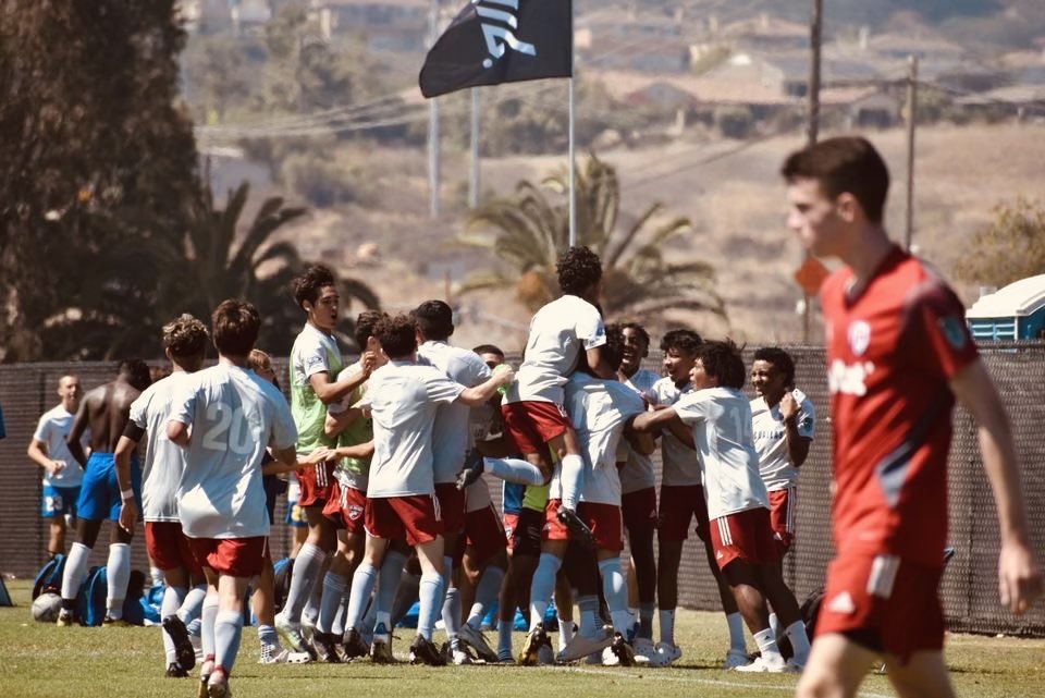 FCDallasYouth's tweet photo. Passion unleashed FCD style 🔥 U16B Premier mob each other to celebrate a goal today during the @ECNLboys playoffs in San Diego. https://t.co/pdolDUE1JR