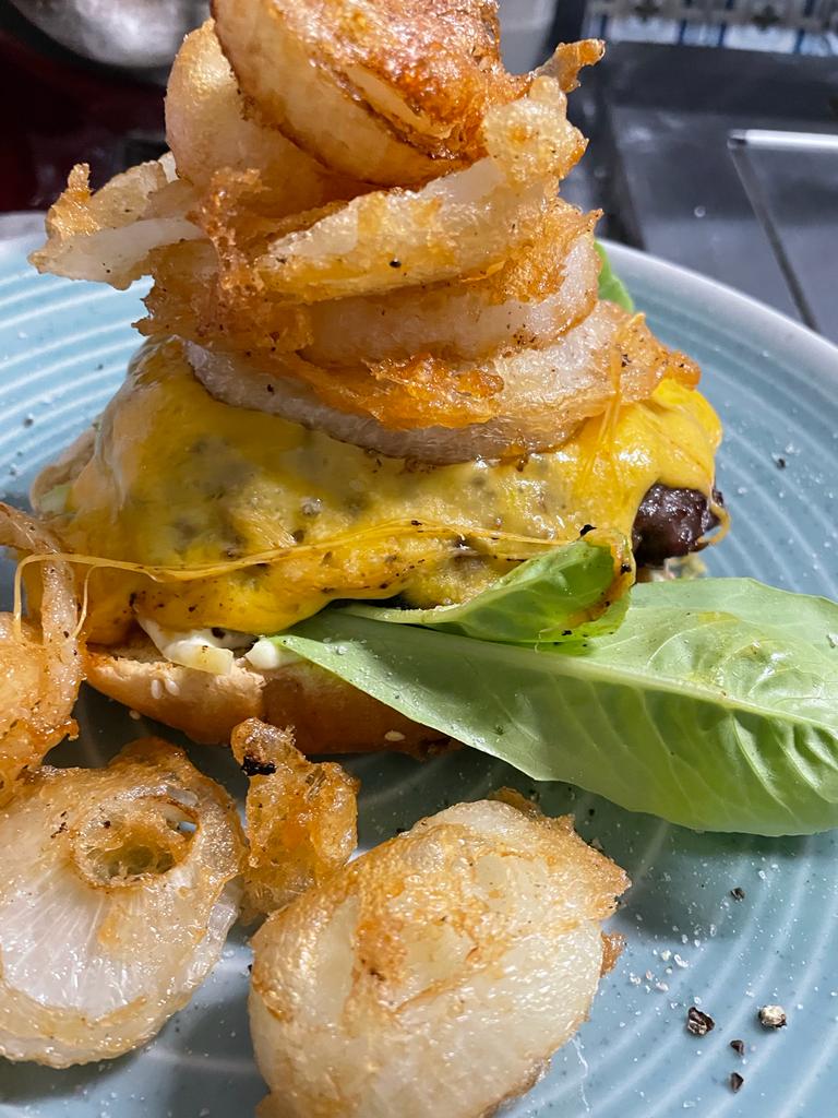 rogerdrags's tweet photo. Steak Burger, with cheese and home made onion rings. This was supper tonight from #ChefRuby https://t.co/zqyTVlgxFl