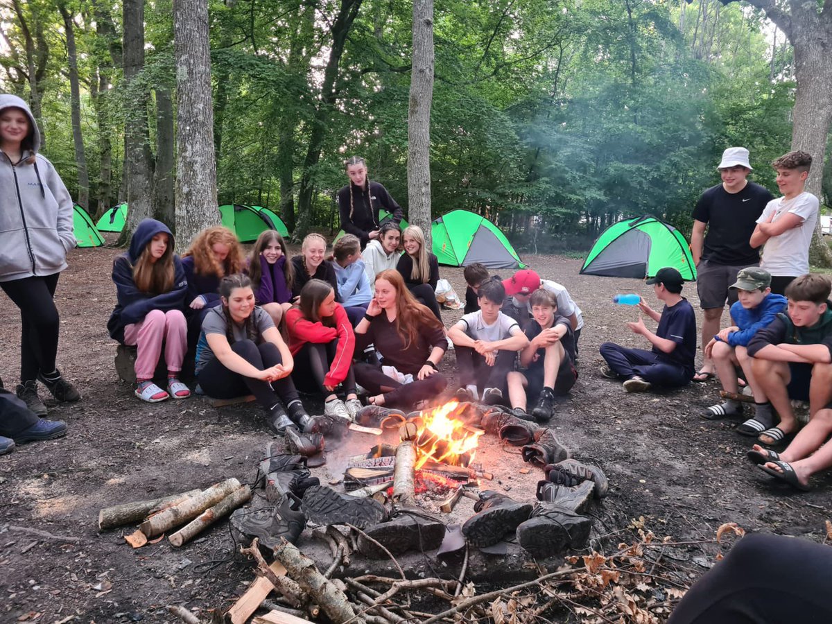 Pupils on Silver @DofE enjoying the camp fire before bed after a drizzly day.