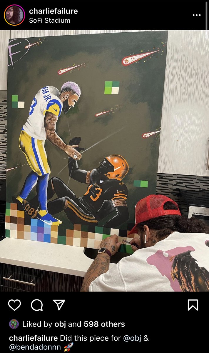 OBJ got a painting of Rams OBJ helping Browns OBJ off the ground