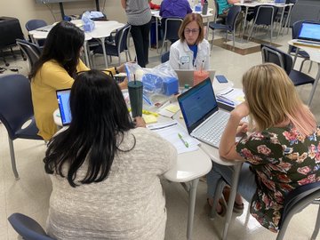 PISDESMath's tweet photo. ๐ค#PISDelemPL teachers, coaches, & administrators are learning & collaborating during PL Summer Training! #PISDMathChat #PISDCurriculum https://t.co/717yUxEIzD