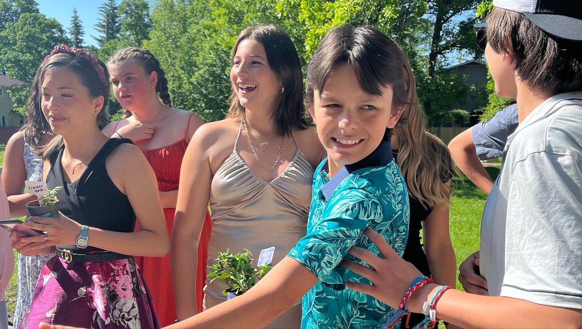 #laidlawevents the whole school celebrated the grade 8’s as they paraded through the hallways while we all cheered. At the end the EY students handed them the potted plants that they hand painted and grew from seeds in the grow tent. Incredible sense of belonging ❤️