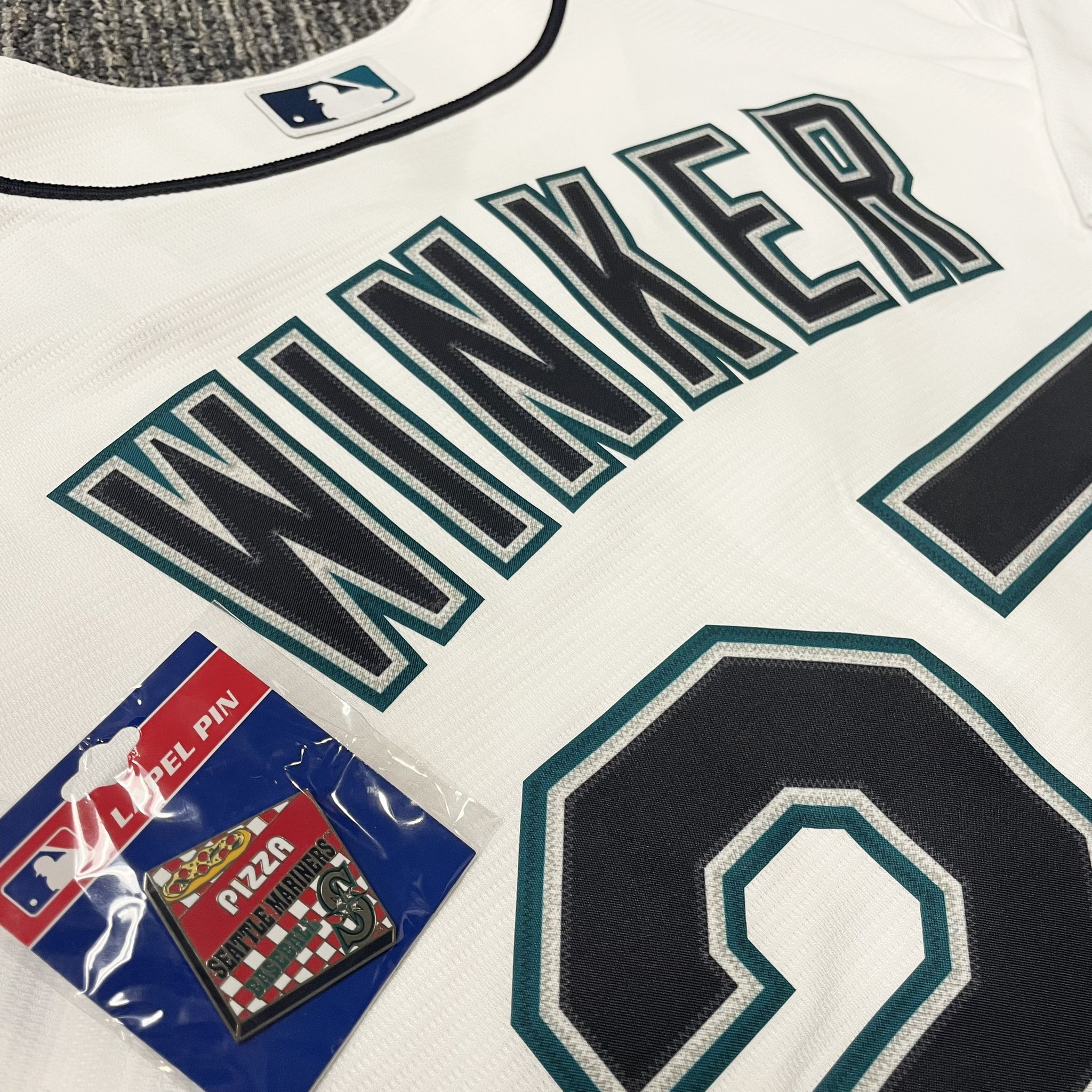 Mariners Team Store on X: TONIGHT ONLY at T-Mobile Park! 🍕🍕 Get a FREE @ Mariners pizza pin with purchase of a Jesse Winker player t-shirt or jersey!  *While supplies last. Available at