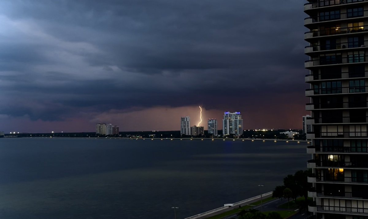 ingurf's tweet photo. @PaulFox13 iPhone shot from Bayshore Blvd. Looks like St. Pete is getting some of our earlier action! #Tampa https://t.co/FQS1BevRYD
