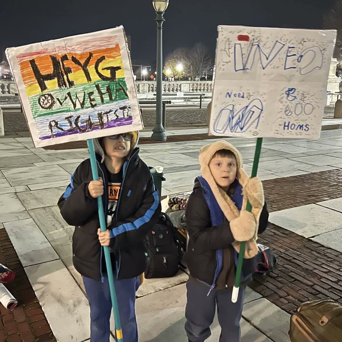 OnwardJenna's tweet photo. @emzconk Seriously cool kids. They'll establish cred in their own campaigns for public office one day by using this photo from @steveahlquist took at #sleepoutri! 😅 "Hey Gov we have rights too" and "we need 600 homes". https://t.co/uG0zXKEF5H