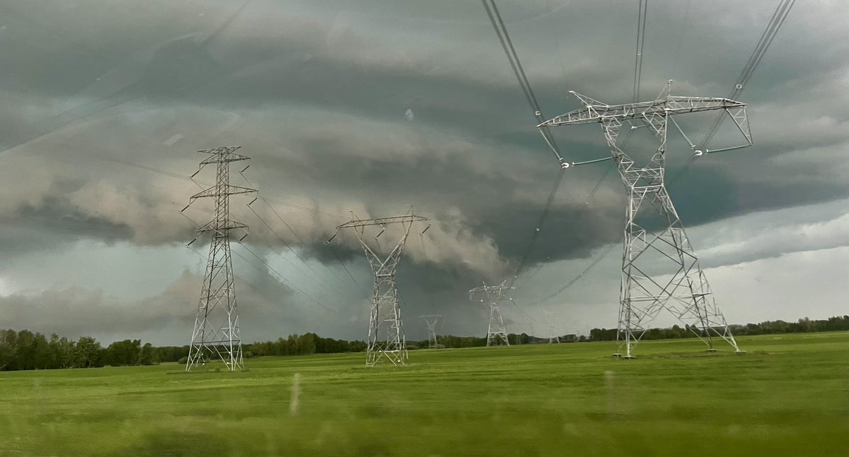 When you happened to be driving under huge power lines during this beautiful storm and it looks like something out of an Independence Day movie! #abstorm