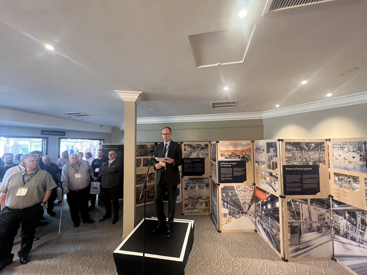 Confedofpaper's tweet photo. CPI DG Andrew Large has opened a photography exhibition to mark the organisations 150th Anniversary - it reflects on the past and capture the industry at work today. Andrew also presented a cheque to @FrogmoreMill towards the restoration of their visitor centre. #cpiconf22 https://t.co/CSsPHtSwaY