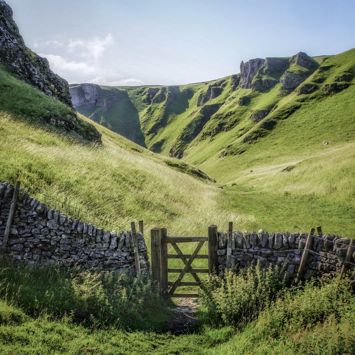 The limestone gorge of Winnats Pass lies at the end of the Hope Valley, a craggy fissure in the earth. It's hard to imagine that this land was once under a tropical sea - until you look at the rocks and see the fossils of the marine animals that lived here 350 million years ago.