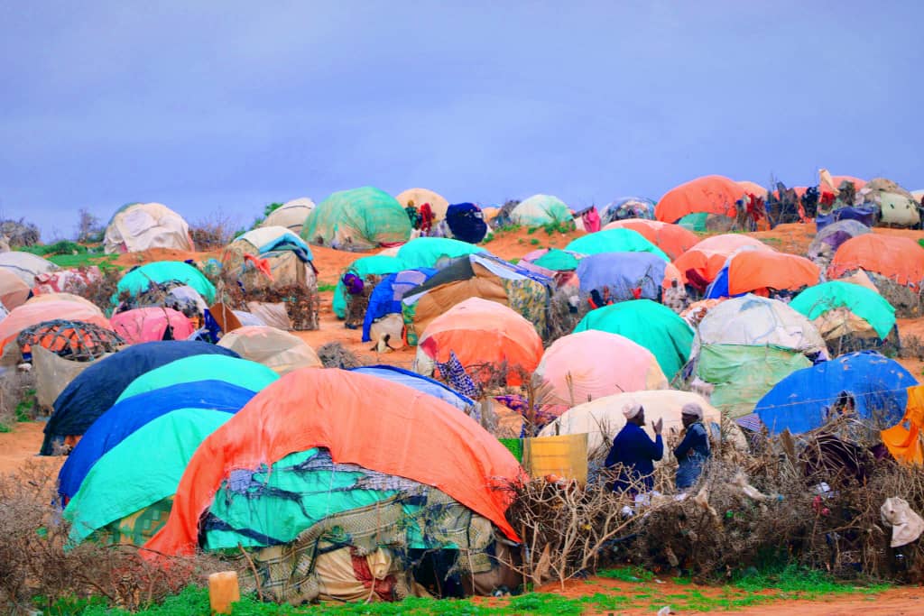 NGOConsortium's tweet photo. "#DroughtinSomalia continues to deteriorate. The current extreme, widespread, & persistent multi-season drought is unprecedented" @NimoA_Hassan on a visit to #Luglow camp to assess the impact amid growing concerns over #famine. #Jubaland https://t.co/PCyn2Xy11s