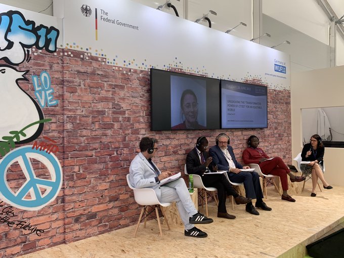 Urbanet_info's tweet photo. "Unleashing the transformative power of cities": Panellists discuss the importance of #urbandiplomacy for all levels of government & address how the global governance system must transform. #GERMANY4LIVEABILITY #wuf11 @MayorKoijee @staedtetag https://t.co/WSjTV8frtk