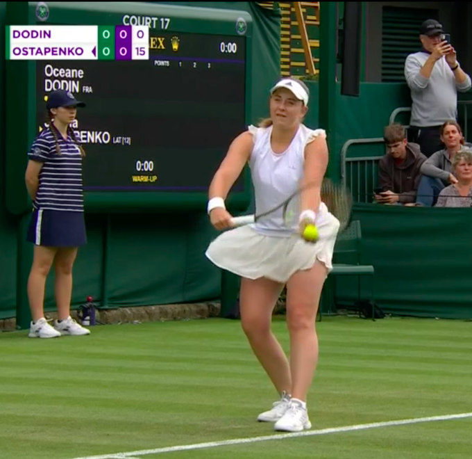 Jelena Ostapenko tests Wimbledon dress code with two-toned outfit during  opening win