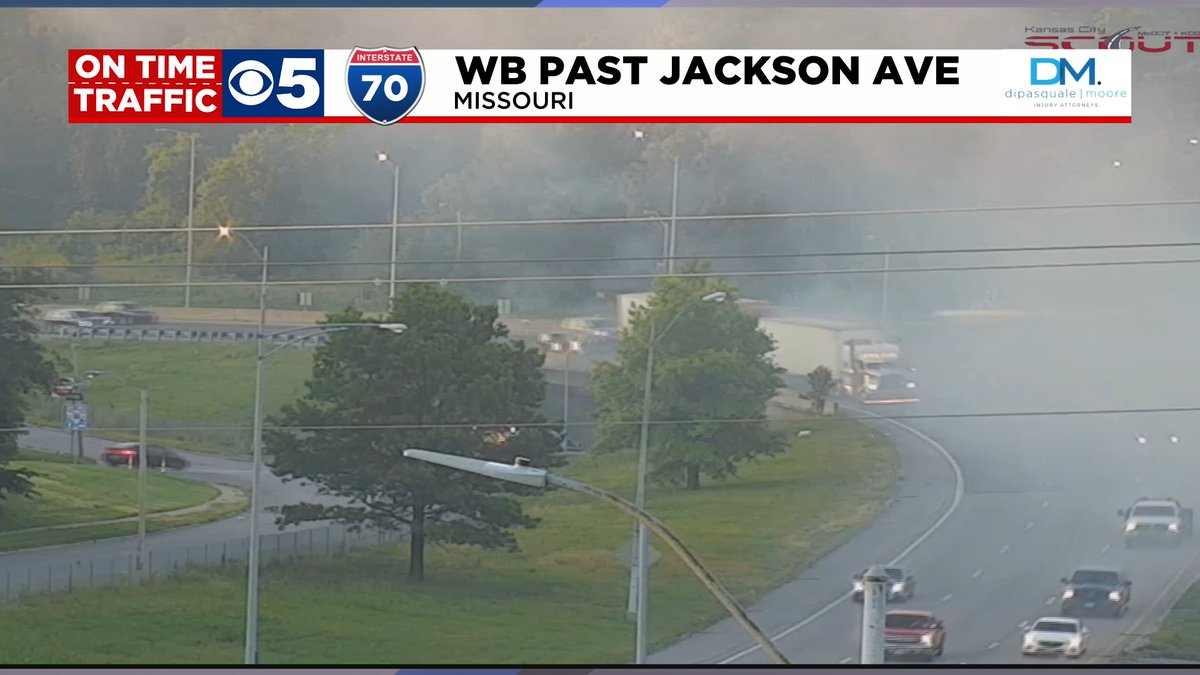 KCTV5Traffic's tweet photo. MO grass fire reported on I-70 WB past Jackson Ave. There is a lot of smoke in the area. @KCTV5 https://t.co/OGjgP1UaKH