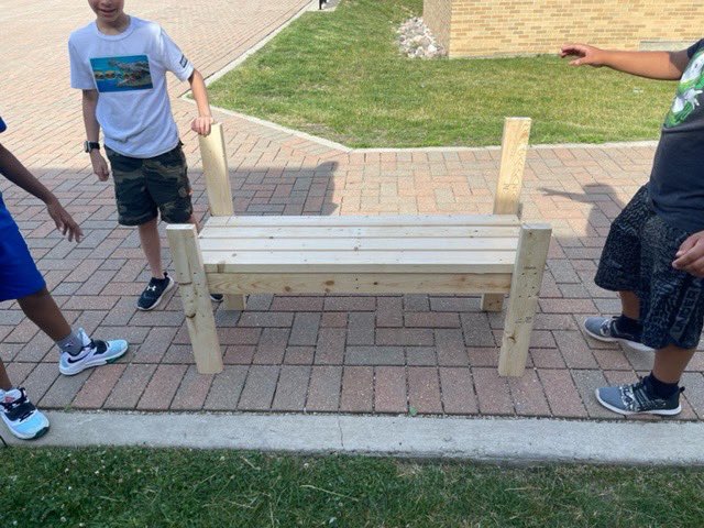 schromj's tweet photo. Some real life math activities on measurement in summer school.  Making a bench from 2x4 kids measured cut and assembled bench https://t.co/jVfmOfkROK