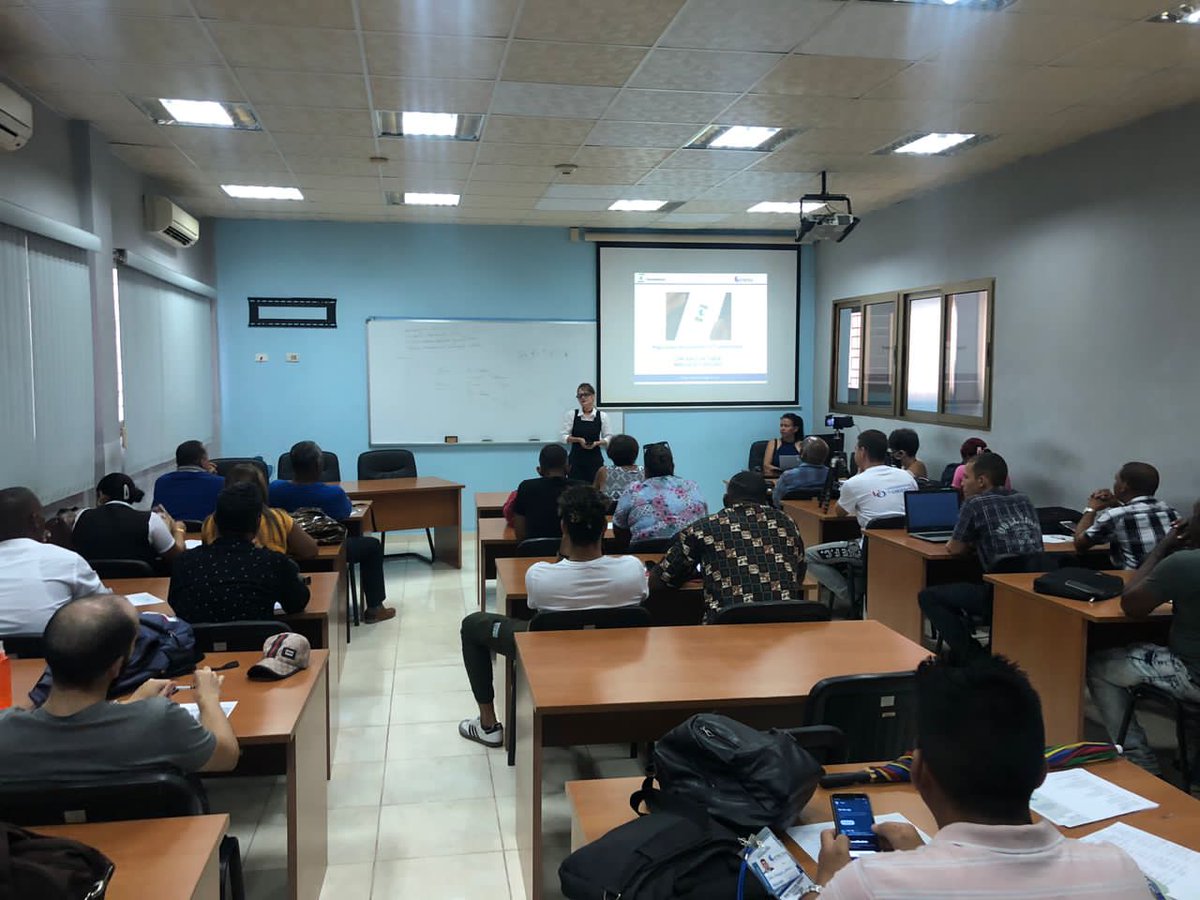 UOCuba's tweet photo. La @UOCuba abre sus puertas al Taller de Comercio Electrónico, donde  especialistas debaten acerca de los problemas, las facilidades y propuestas que traen los profesionales correspondientes al mundo de la electrónica. Se encuentran miembros de ETECSA, Citmatel y Xetid. #75UO https://t.co/RLK0suEf8N