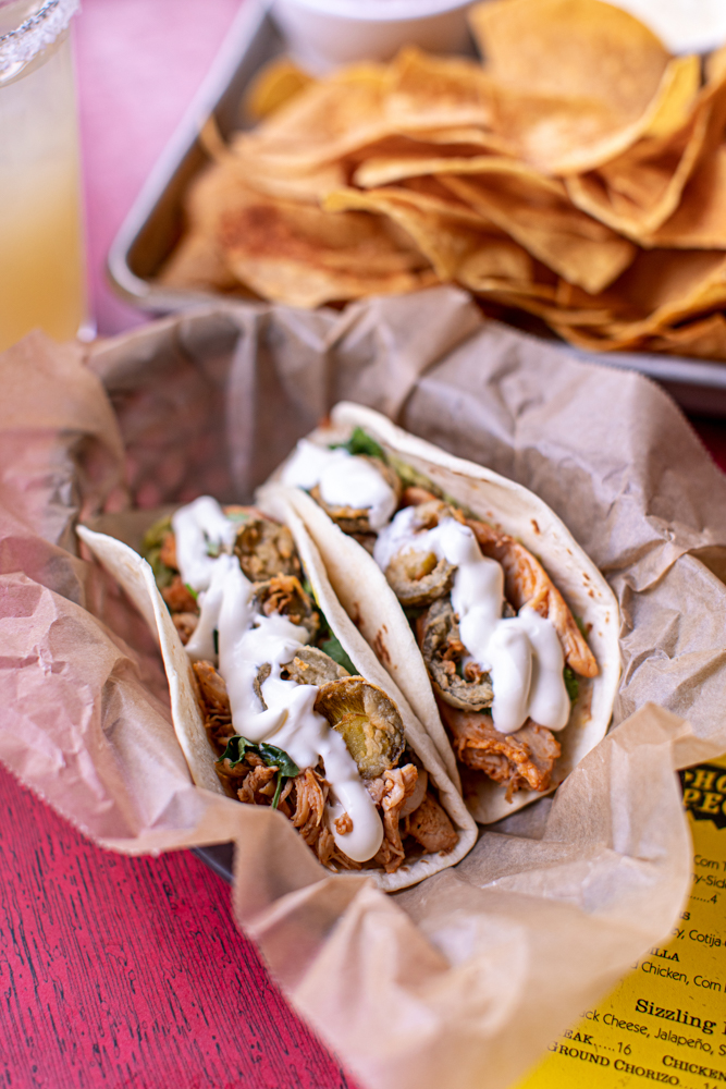 ElTacoATL's tweet photo. It's a good day for tacos....happy #TacoTuesday! 🌮🌮🌮

*Pictured: our Smoked Chicken Tacos filled with guacamole, fried jalapenos, crema &amp; cilantro🌿 #TheOriginalElTaco https://t.co/WJwqCjuHlq