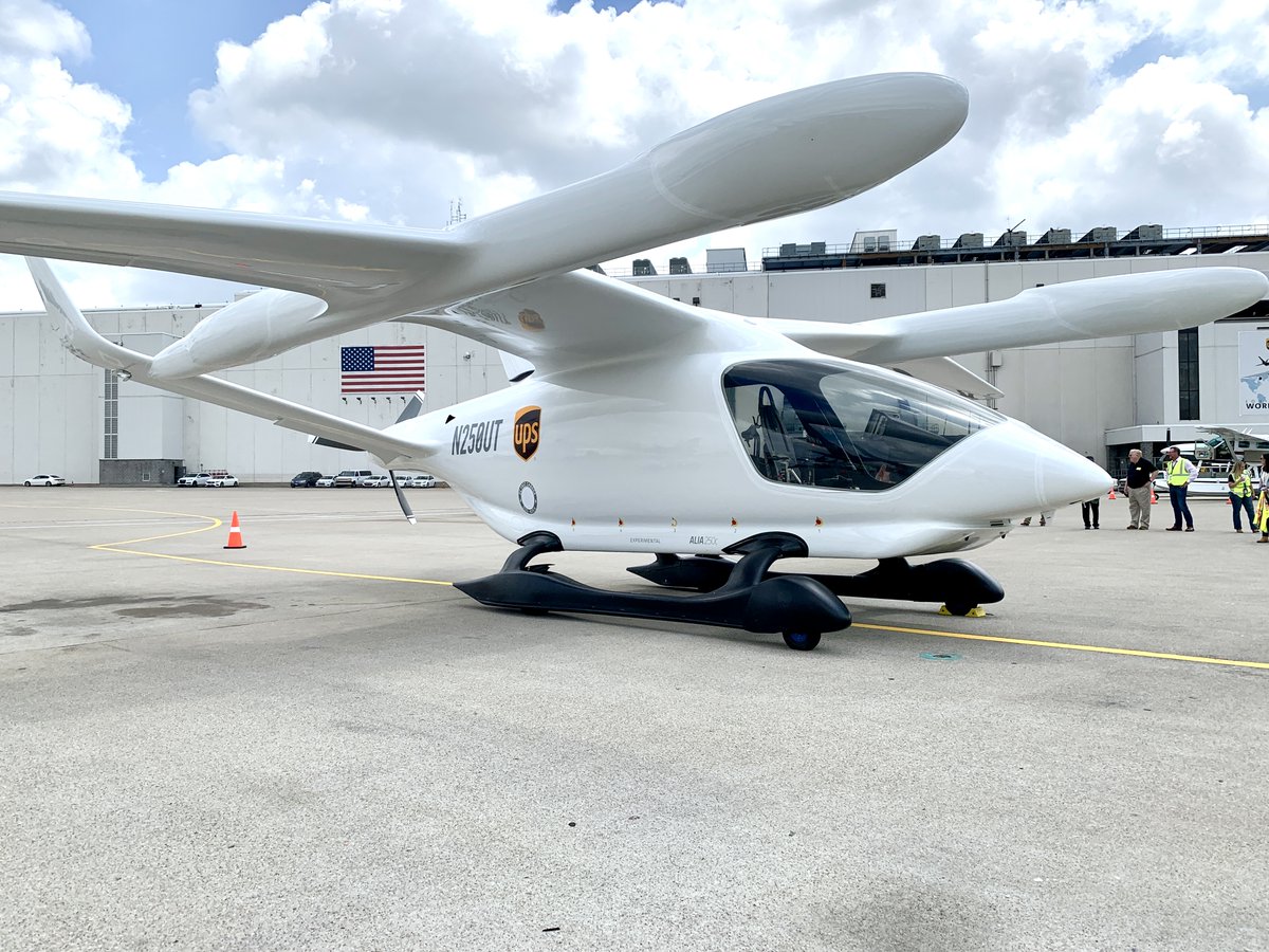 UPS's tweet photo. It's #Electric! ⚡ The new eVTOL aircraft from BETA Technologies made a guest appearance at our Louisville hub recently –the first electric cargo aircraft flight to our WorldPort hub! This near-silent aircraft reduces time-in-transit and vehicle emissions. #sustainability https://t.co/SItyhibvZm