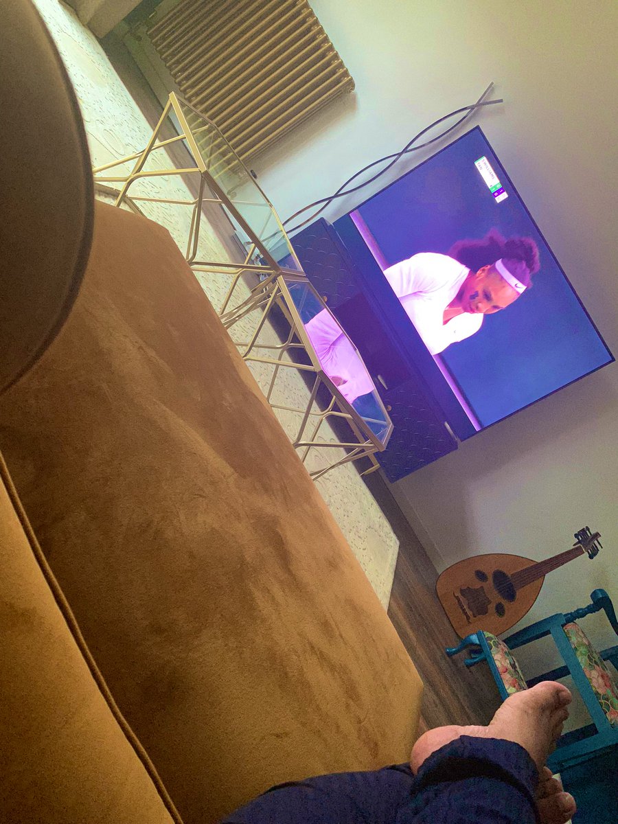 This is life! Watching a beast of an athlete (Serena Williams) while sitting on the sofa struggling to get up without making grunting noises.