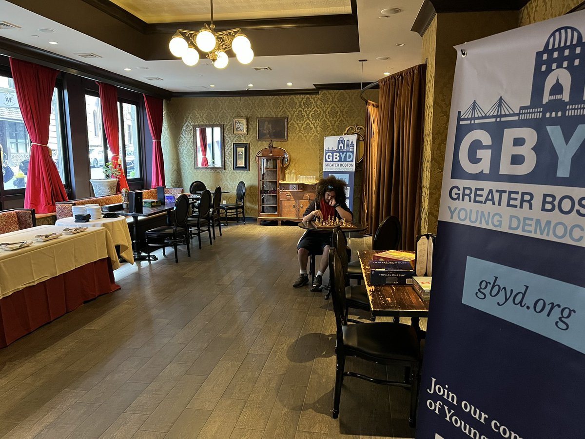 GBYoungDems's tweet photo. We hope you’re getting pumped for our game night at Carrie Nation starting at 5pm! @_bencohen is here helping Chair @DErnst3451 get set up and playing a game of chess! Looking forward to seeing @RepChynahTyler, @TommyVitolo, @MayorDriscoll, @EricLesser, and @ShannonForAG &amp; more!! https://t.co/Nv8peRJVss
