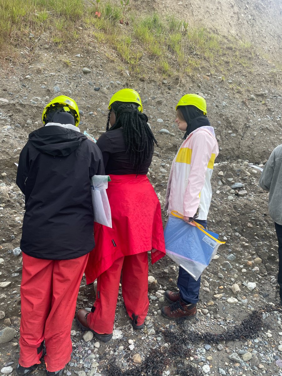 The sun eventually came out when we got to the coast and got the hard hats out! Here's a few of them investigating glacial deposition <a href="/FSCRhydyCreuau/">FSC Rhyd-y-creuau</a>