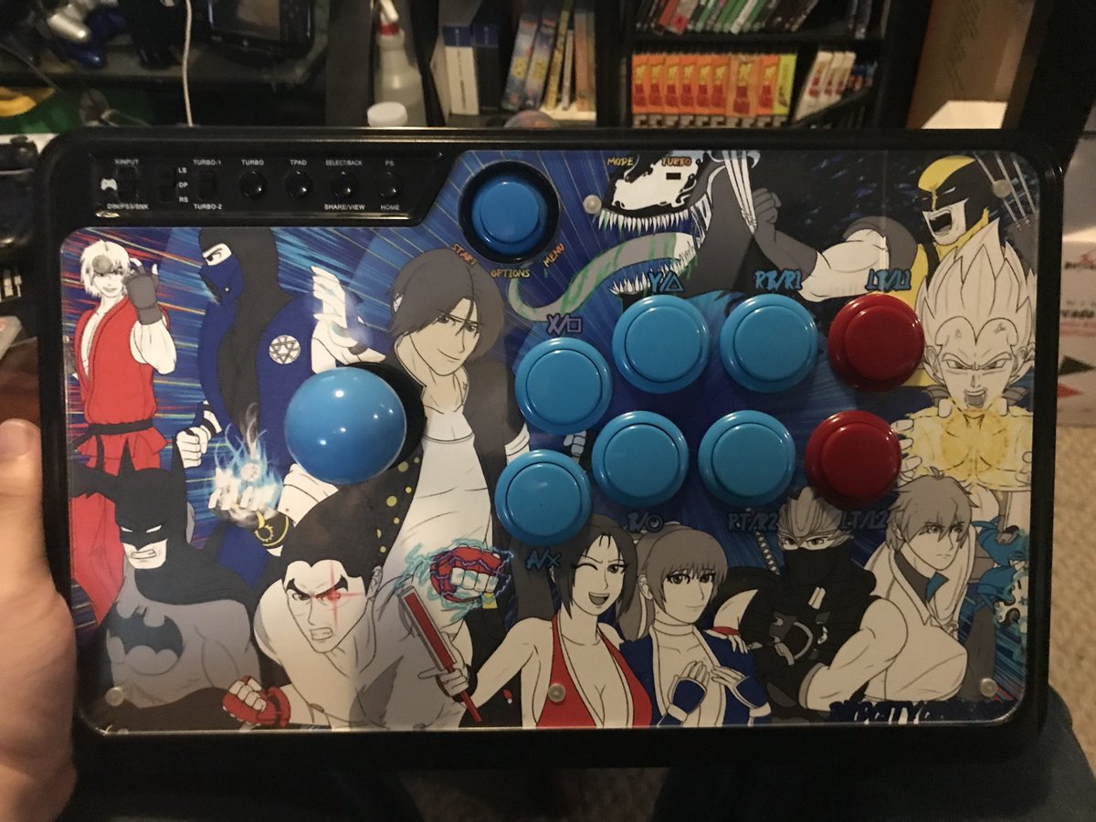2ndCityCrusader's tweet photo. My own custom fightstick art print finally arrived! It was a long wait and a painstaking process to assemble it altogether (even to make a small crack at the top right of the shield), but it was all worth it!🤩
#FGC #SFV #SF6 #MK11 #KOFXV #T7 #DOA6 #GGST #DBFZ #freemvc2 #IJ2 #EVO https://t.co/fpHqEvQ8HC