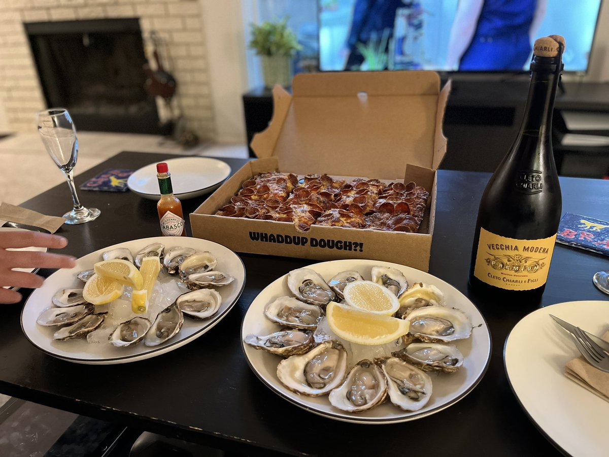 Having what has become a special occasion tradition at our place right now.  <a href="/effingoyster/">Effing Rob</a> oysters, @thehighdough Detroit-style pizza, and <a href="/SherbrookeLiq/">Sherbrooke Liquor</a> Lambrusco. 
Holidays have begun. Next stop <a href="/WBogotaHotel/">WBogota Hotel</a> and <a href="/colombia_travel/">Colombia Travel</a>!
