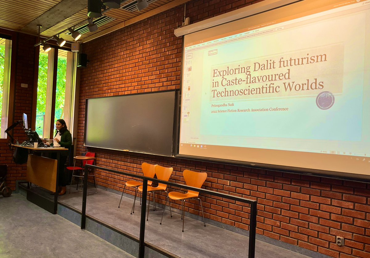 Priteegandha Naik on Dalit Futurisms, an interdisciplinary project on technology, technoscientific culture and castes, examining how caste is deployed in @samitbasu’s “Chosen Spirits”  @co_futures @sfranews #sfra2022