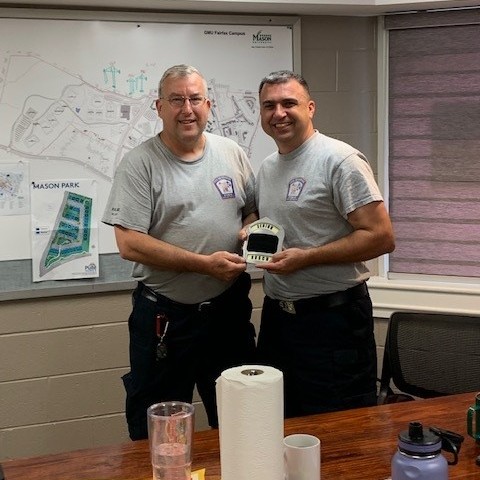 CityofFairfaxFD's tweet photo. We don't #PassTheTorch upon #retirement, we #PassTheSeniorShield to the next highest in seniority. #Congratulations to #MasterTechnician Pittard on his retirement and to Master Technician Busch on his new #senior spot. #ServiceTimeNotAge #YoungAtHeart @CityofFairfaxVA https://t.co/5BysD0EV0v