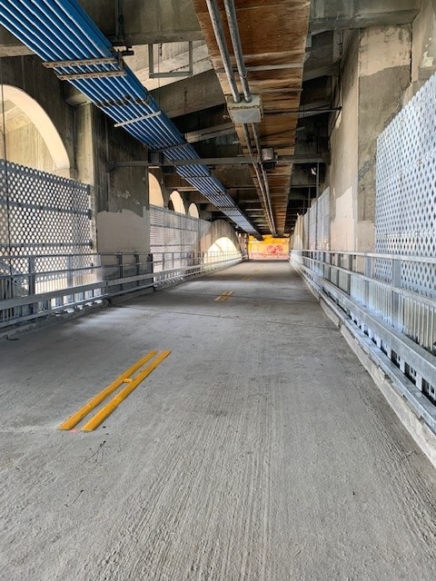 yyctransport's tweet photo. The Centre Street Bridge Lower Deck rehabilitation is now complete! This work included new railings and screens above the concrete arches. The bridge is open for cycling and walking but will remain closed to vehicle traffic until Fall 2022 due to flood mitigation work. https://t.co/0SNGqQ8MNH