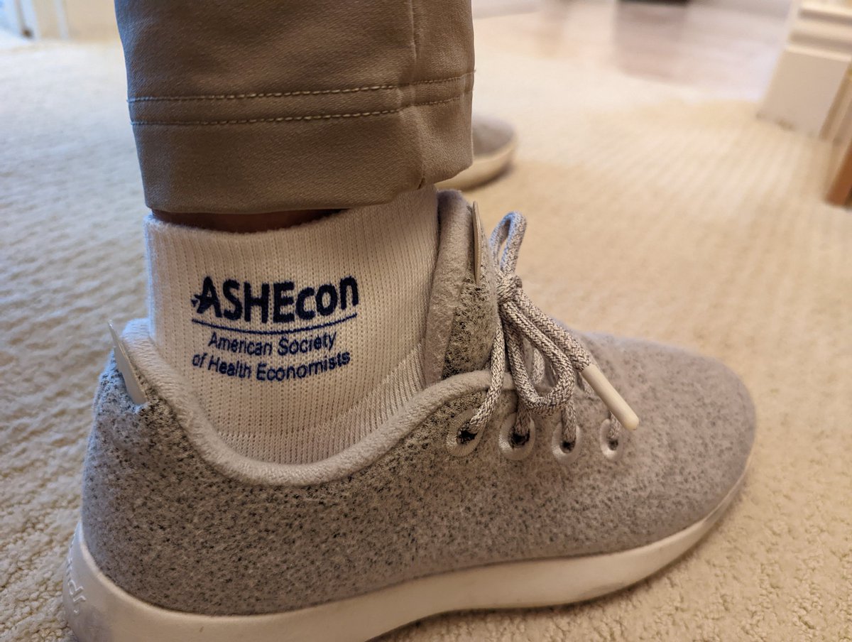 EconTony's tweet photo. ASHEcon socks? Yes please and thank you, @ashecon! #ASHEcon22 https://t.co/hKk3oncZhS