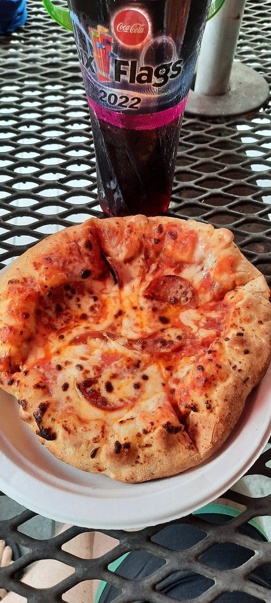 This fresh, made-for-me pepperoni pizza at <a href="/SF_WhiteWater/">Six Flags White Water</a> actually tasted decent. The sauce and cheese was all slipped in the middle, but that gave it a variety of textures.
Glad I didn't pay $15 for it, but definitely worth using my meal plan for it.