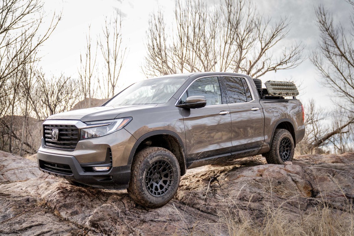 Powers4x4's tweet photo. Added this Honda Ridgeline to our garage this year. It's a '22 RTL-E with @FirestoneTires AT/2, Black Rhino Boxer wheels, @goFrontRunner bed rack and a @TraxdaLiftKits 2" puck lift. https://t.co/XFgfHU5WAv