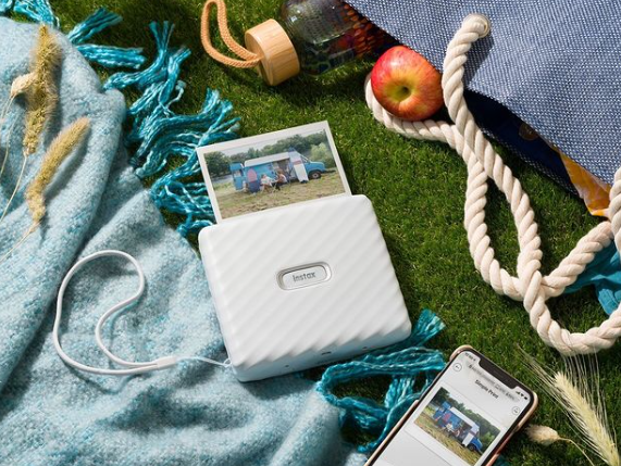 FujifilmUS's tweet photo. From FUJIFILM @instax: The apple of our eye this summer is the Link Wide! Which summer memories would you print wide? 💭⁠ #DontJustTakeGive⁠ #GiveSomethingReal⁠ #LinkWide⁠ #LiveLifeWide⁠ #Picnic https://t.co/HAif3OGyO4