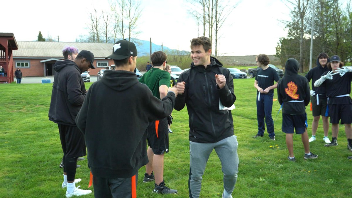 CFLonTSN's tweet photo. This past spring, the BC Lions - including Nathan Rourke and Bo Lokombo - launched an Indigenous Youth Flag Football program, teaching Indigenous youth the game and life skills. 

A closer look at how the team is reaching out to Indigenous communities: https://t.co/sZbnMNxTZp https://t.co/D1L7xZgA5F