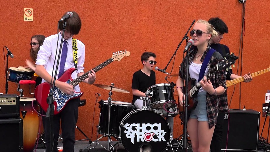 If you've seen School of Rock the movie, you should check out School of Rock, Silver Spring, playing live here every Friday, 3-4pm through August 12th. Young aspiring musicians jamming out to their favorite hits. Great way to start the weekend, live music and beer.