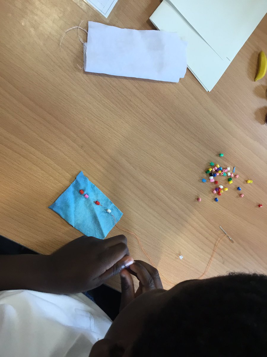 MissMAbraham's tweet photo. What a wonderfully creative afternoon we’ve had. To prepare for making Romanian-inspired vests, we practised attaching beads to fabric, and fabric to fabric using running stitch. #DTIsCentral 🪡🧵 https://t.co/v5Yb3fvTtm