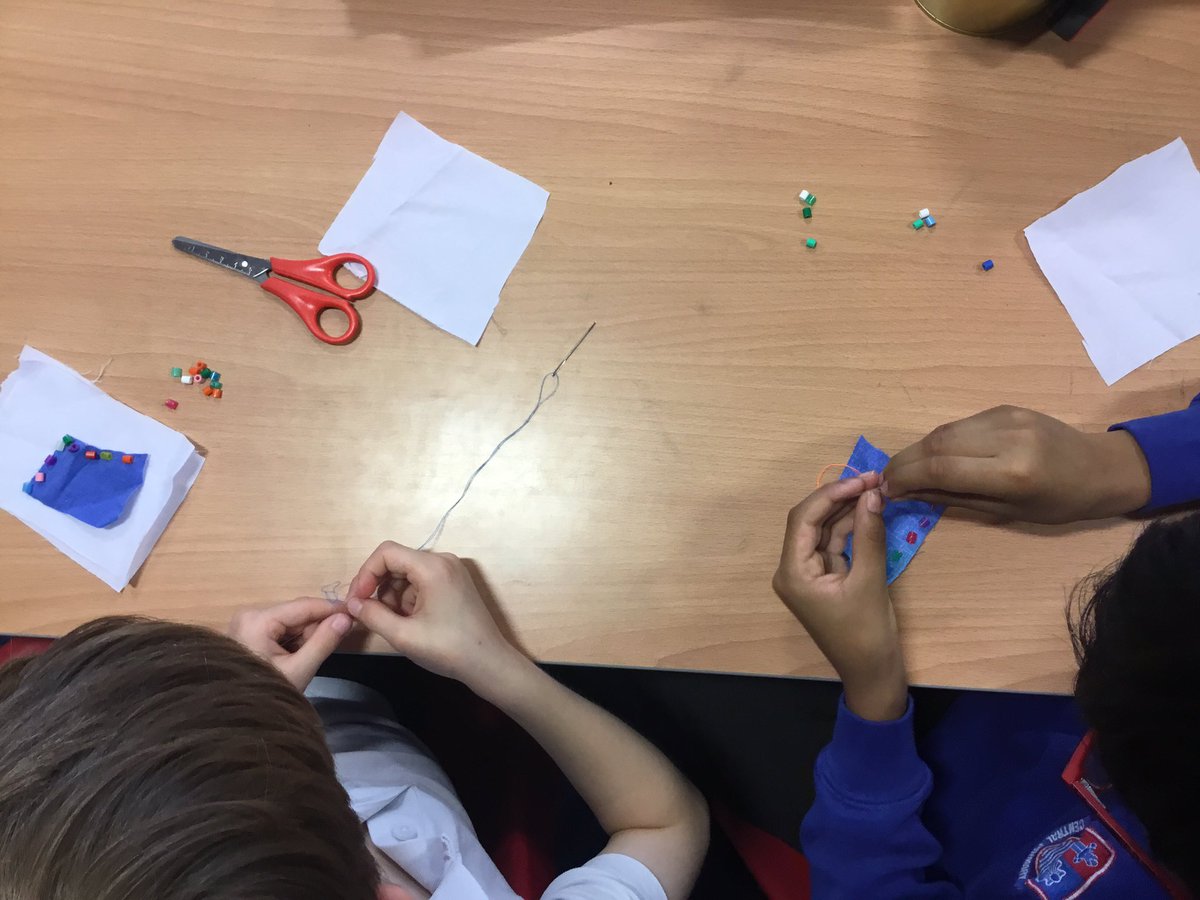 MissMAbraham's tweet photo. What a wonderfully creative afternoon we’ve had. To prepare for making Romanian-inspired vests, we practised attaching beads to fabric, and fabric to fabric using running stitch. #DTIsCentral 🪡🧵 https://t.co/v5Yb3fvTtm
