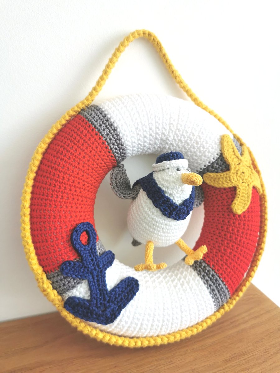 TheCrochetBarn2's tweet photo. I had much fun making this wreath, especially as a seagull swooped down and took hubby's croissant off the garden table yesterday. Weirdly he didn't find it as funny as me 😂 https://t.co/1H1rgcHQaI